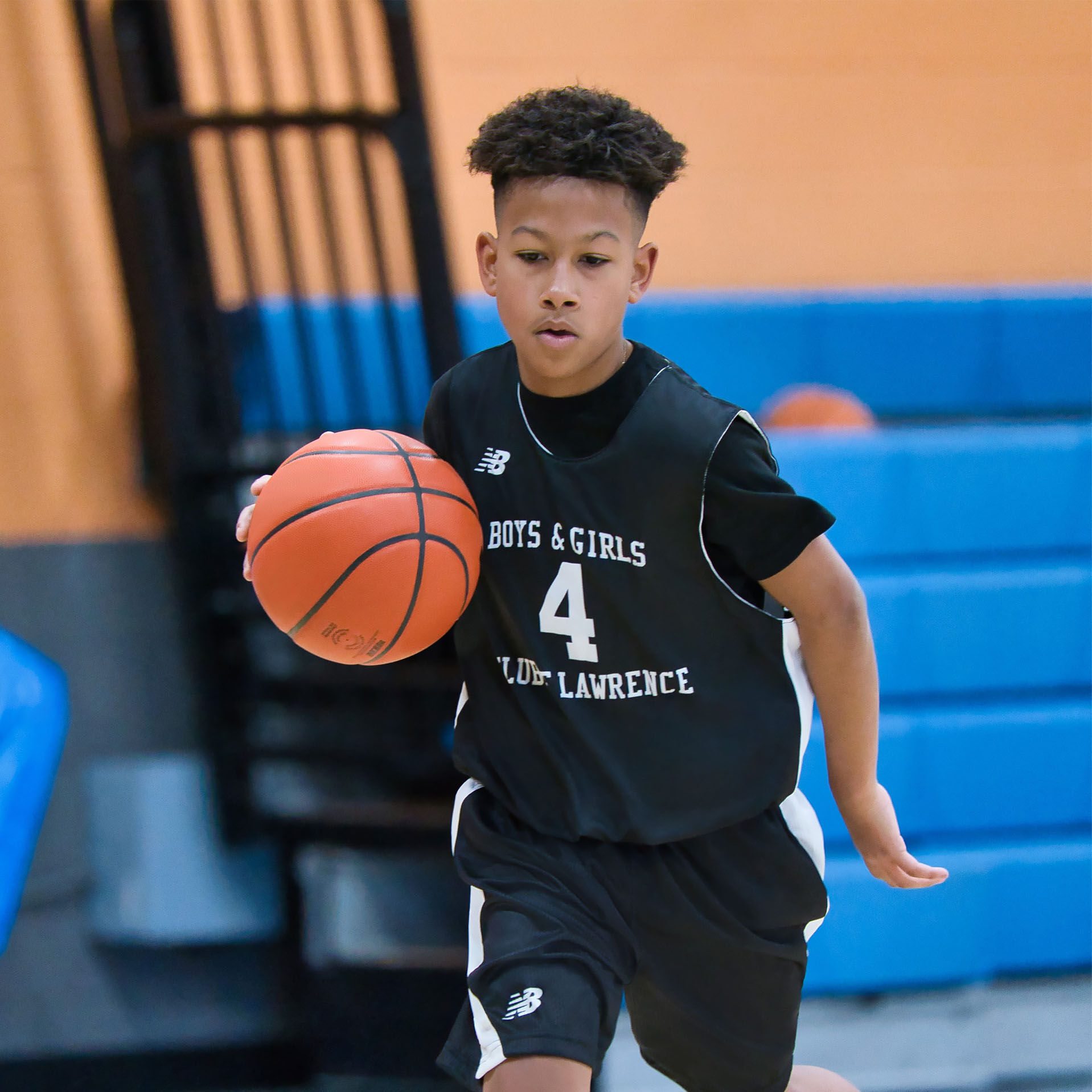 Boy playing basketball