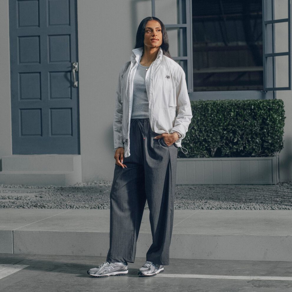 Sydney McLaughlin-Levrone wearing a pair of grey 204L